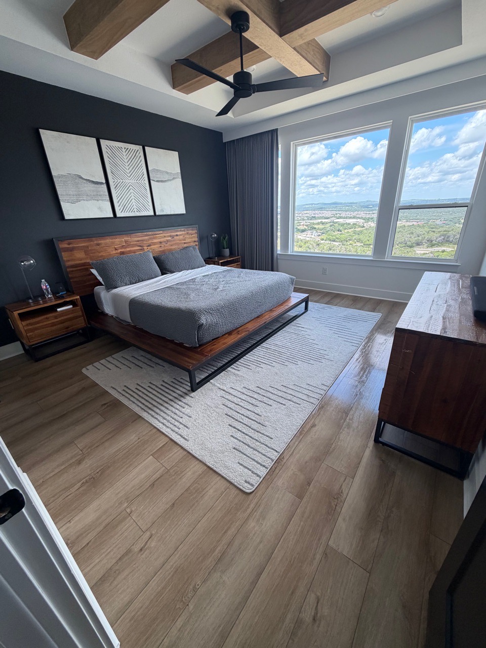 A made bed staged for guest arrival