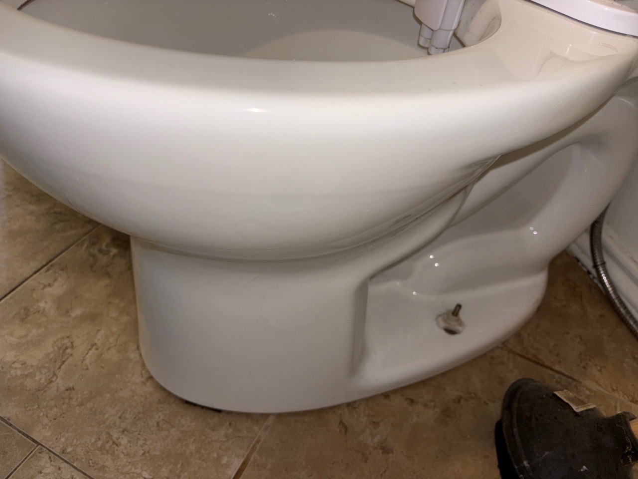 Toilet base and floor area after cleaning